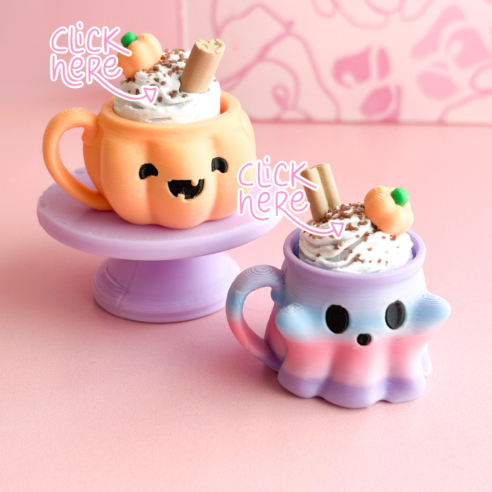 Two cute, colorful mugs with whipped cream and cookies on a pink background