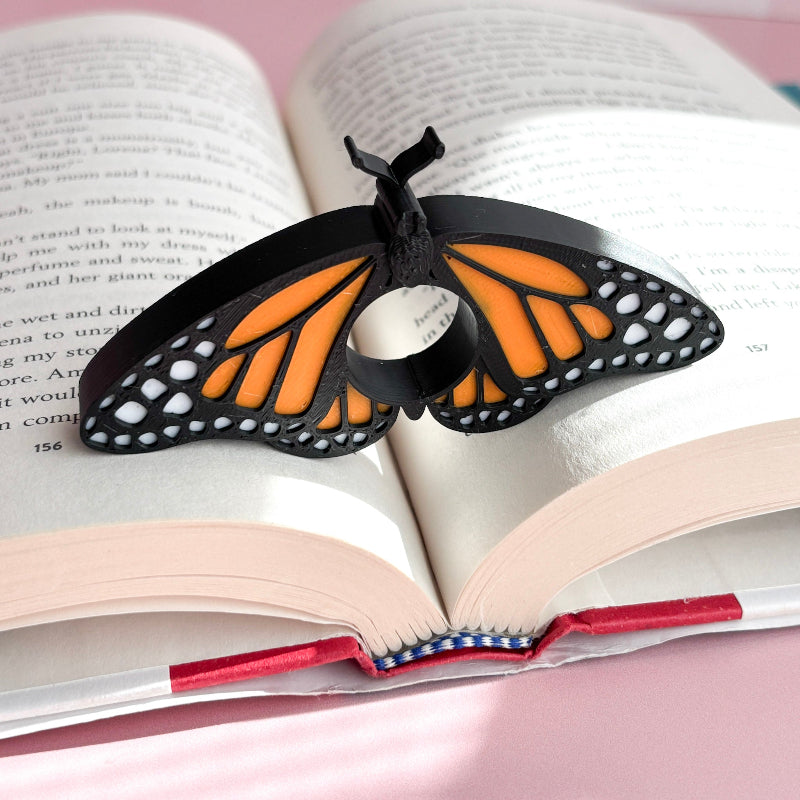 Butterfly-shaped bookmark on an open book