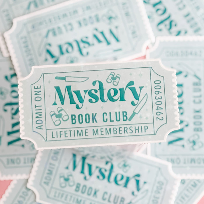 Sticker with 'Mystery Book Club Lifetime Membership' text on a light blue background