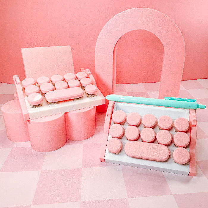 Typewriter fidget clicker and sticky note holder