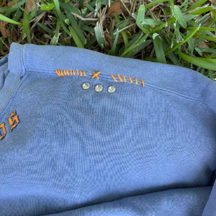 custom hand embroidered sweatshirt with rivets