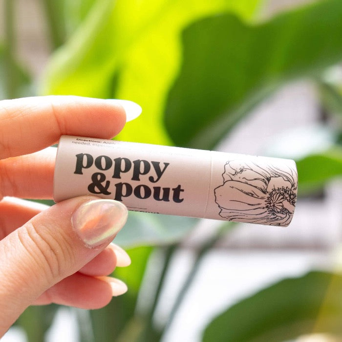 Take your lips on a tropical vacation! Our Island Coconut Lip Balm smells just like those summer months spent on the beach and keeps your lips hydrated for hours. Every Poppy &amp; Pout lip balm is made with 100% natural ingredients and hand-poured into eco-friendly cardboard tubes.
