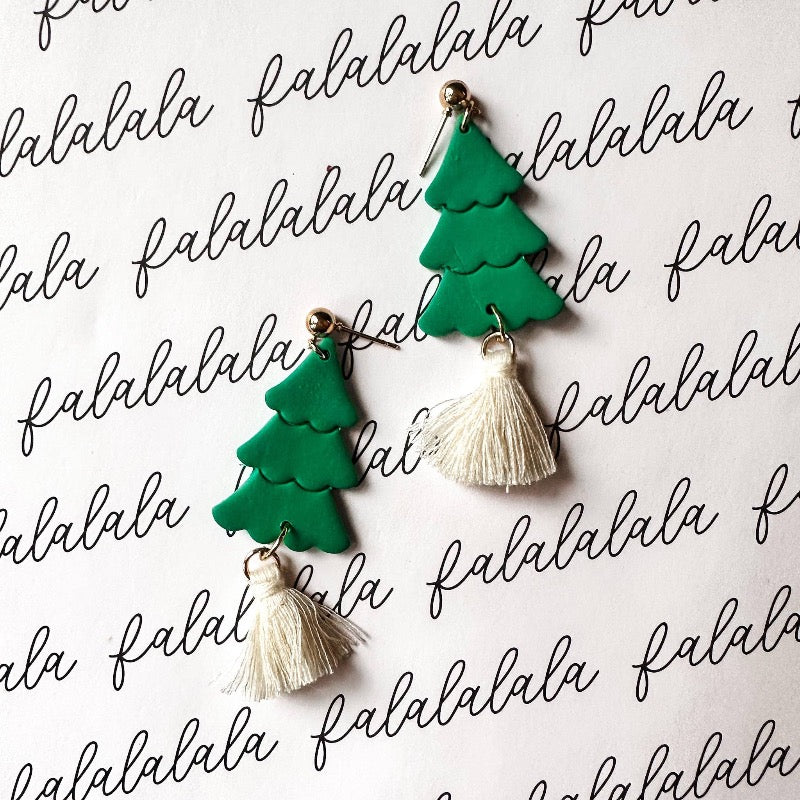 Feel festive this Christmas season with these fun green tassel earrings! Handmade with love and crafted from quality polymer clay, you'll be admiring these holiday-inspired goodies all season long. Put a little Christmas cheer in your style!