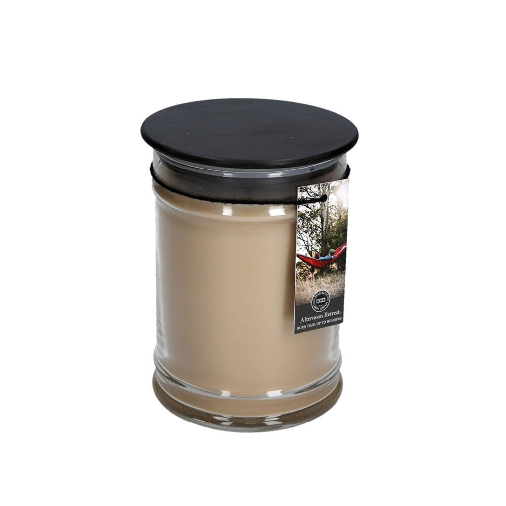 Our original 18oz Large Jar Candle is the perfect way to enjoy your favorite Bridgewater fragrance. This timeless glass jar includes a black wooden lid and a hangtag that features a picture of a child who is supported through our LIGHT A CANDLE · FEED A CHILD program. The vessel can be reused as a part of your home decor Fragrance: Afternoon Retreat Fragrance Description: Sink back into a bed of soft moss, teak, sandalwood and amber as a light, refreshing breeze of bergamot and lime sweeps through the air.