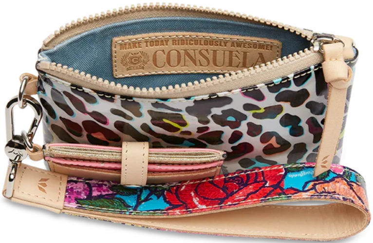 The Combi, a combination of on-the-go accessories, is a new way to carry your keys, cards, and the small stuff at all times. This colorful wristlet wallet includes a pocket pouch, secure card slot wallet and fits comfortably around your wrist- ready for your next&nbsp;journey