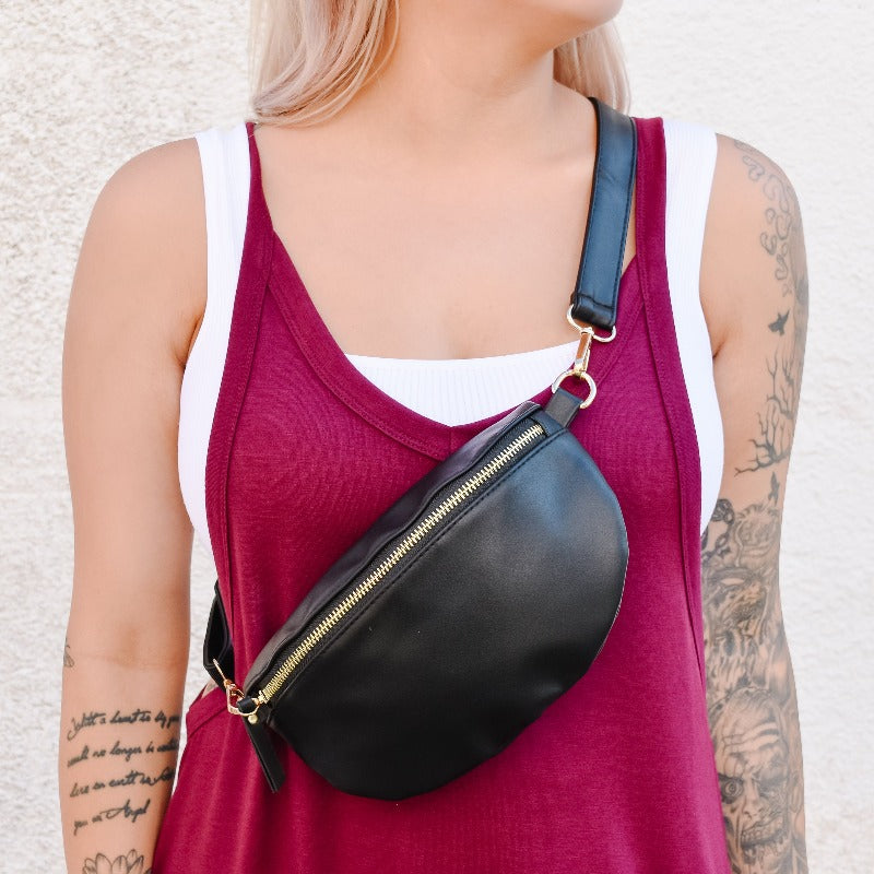 The Emma Bum Bag is made from a soft vegan leather. This bag features an adjustable strap so it can fit all sizes. With gold hardware and an interior zipper pocket, it’s the perfect way to store your essential items in style. Emma fits all sizes and our fun straps can be added for a pop of color.