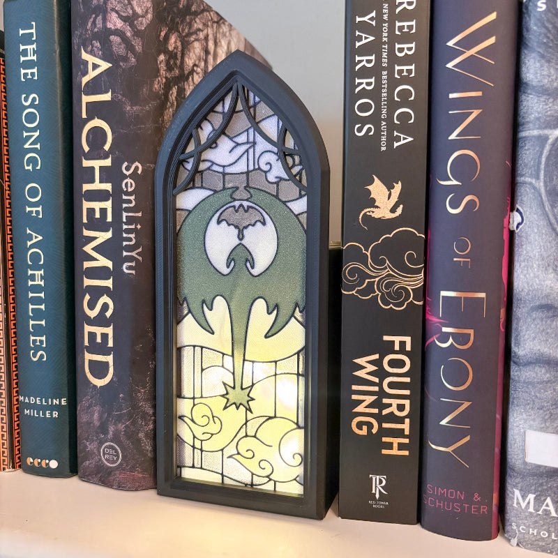 3D printed stained glass with dragon book holder with books on either side
