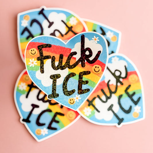 Heart-shaped stickers with colorful text and designs on a pink background