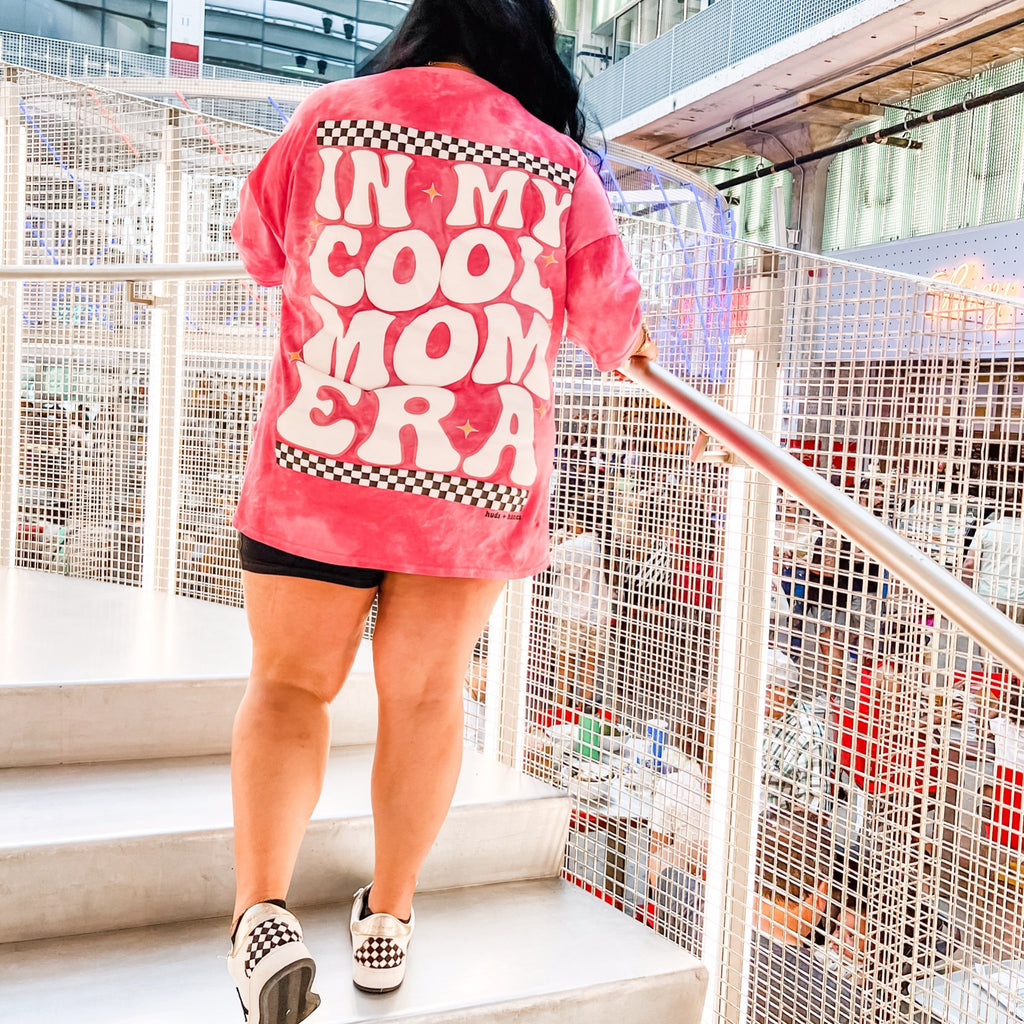 An Era all of us Mamas are in! ✨ Fun, hot pink tye-dye with Puff Print graphic on the back! Intentional oversized fit, no need to size up! Pair with some bikers + sneakers or jeans for a perfect everyday outfit!