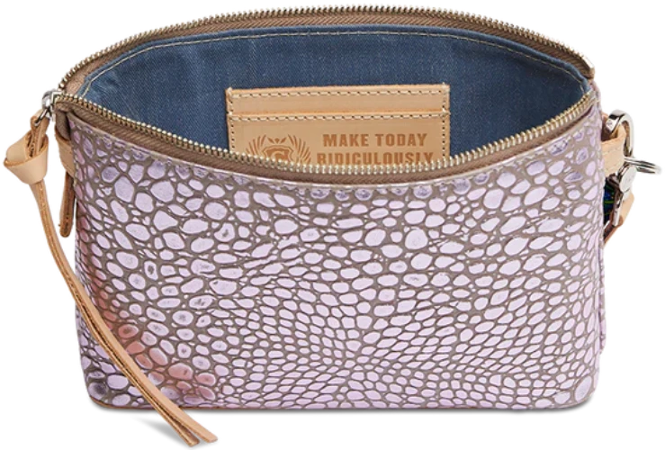 Keep your phone, keys, and wallet in this take-anywhere crossbody! An open pocket and a credit card slot pocket make this colorful leather crossbody bag a go-to for heading out the door. 