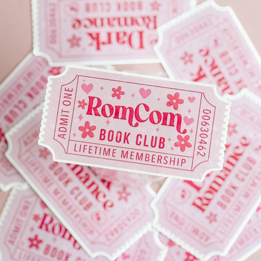 Pink 'RomCom Book Club' membership tickets on a light pink background