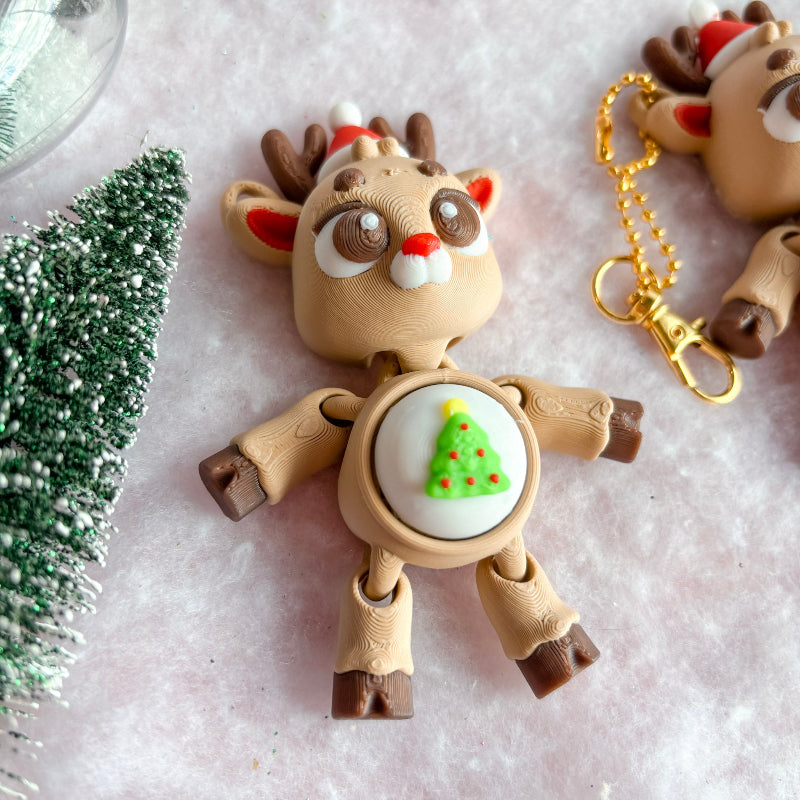 Toy reindeer with a Christmas tree design on a light background