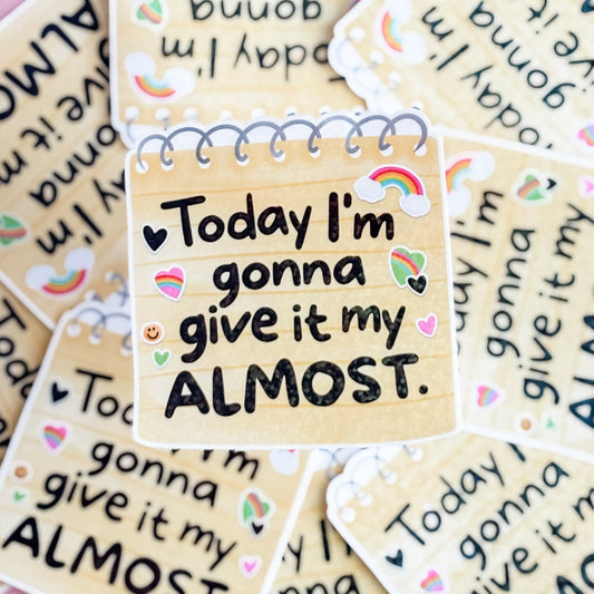 Motivational stickers with text 'Today I'm gonna give it my ALMOST' on a beige background.