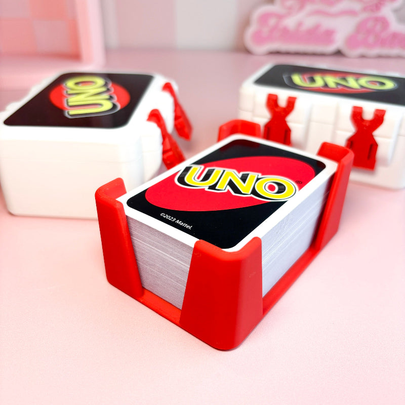 boxes with  UNO wording with pink backgound
