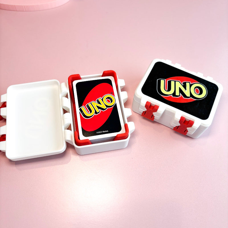 boxes with  UNO wording with pink backgound