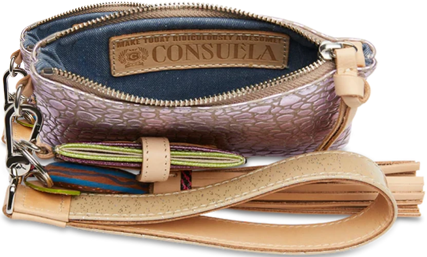 The Combi, a combination of on-the-go accessories, is a new way to carry your keys, cards, and the small stuff at all times. This colorful wristlet wallet includes a pocket pouch, secure card slot wallet and fits comfortably around your wrist- ready for your next&nbsp;journey.