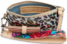 The Combi, a combination of on-the-go accessories, is a new way to carry your keys, cards, and the small stuff at all times. This colorful wristlet wallet includes a pocket pouch, secure card slot wallet and fits comfortably around your wrist- ready for your next&nbsp;journey