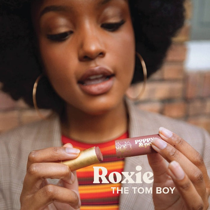 ROXIE "THE TOM BOY" Our Roxie Lip Tint is the coolest shade of burgundy and looks great on everyone! There’s a reason why it’s been our best seller since its launch.