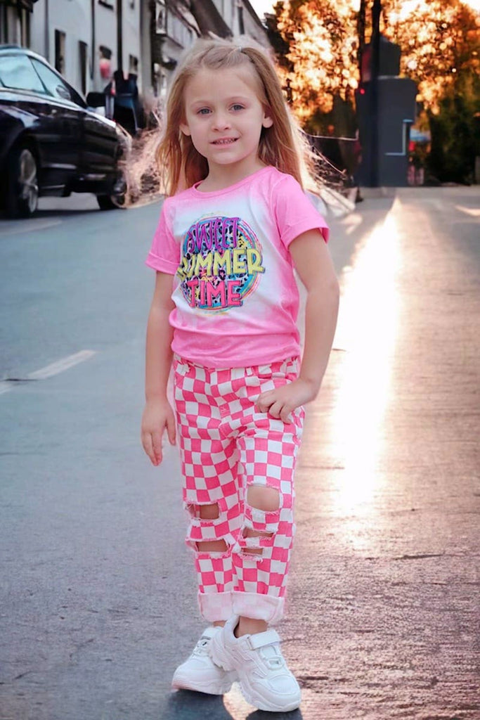 Let your little one rock these cool Hot Pink Checker Distressed Denim Pants. The checker details make them totally one-of-a-kind, and the hot pink color puts a fun touch on any outfit. Perfect for your fashionista!