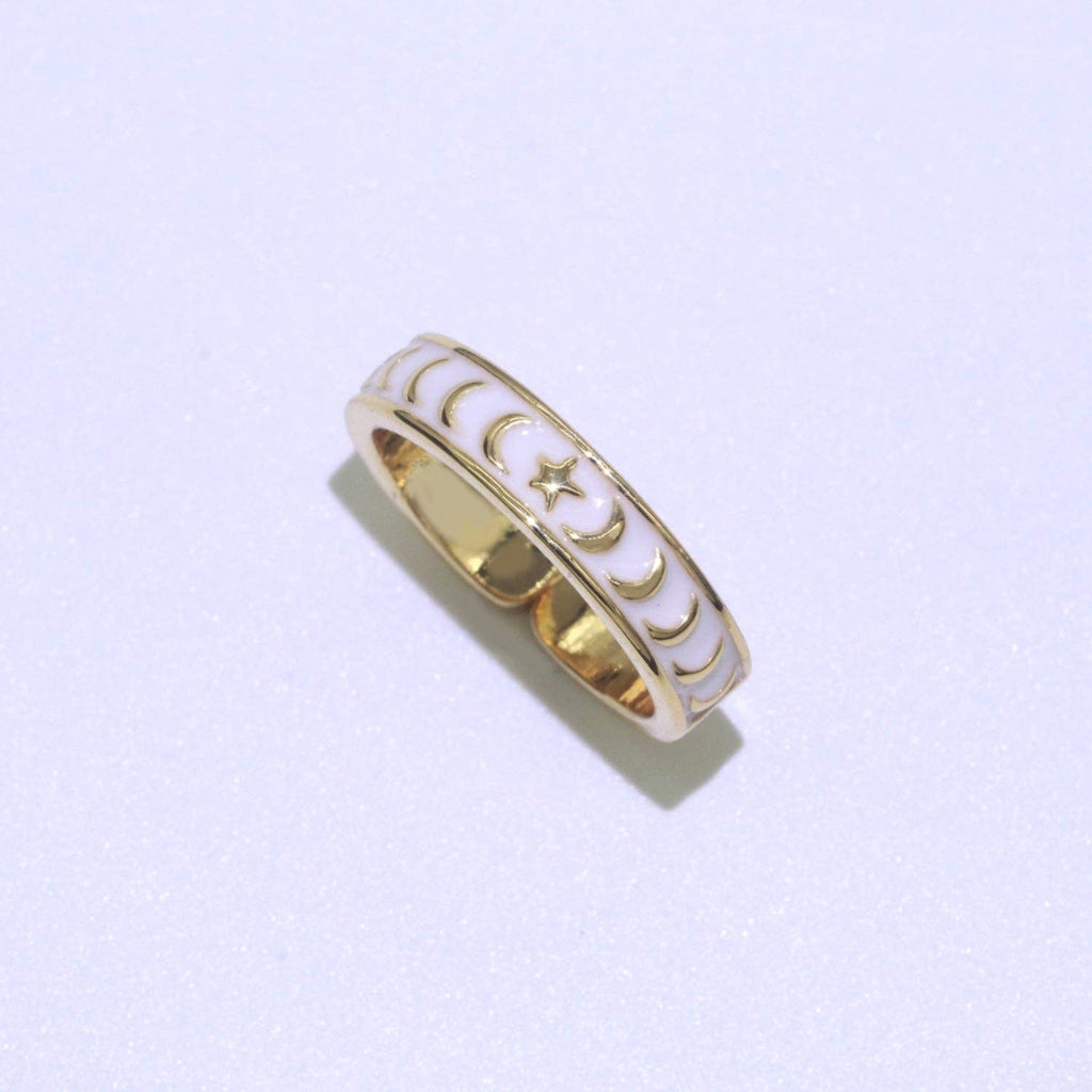 Galaxy enamel ring in white Details:  14k Gold Filled Material: Brass, Gold Filled, Enamel Size: Adjustable one size fits most  Color: Gold Lead Free, Nickel Free 
