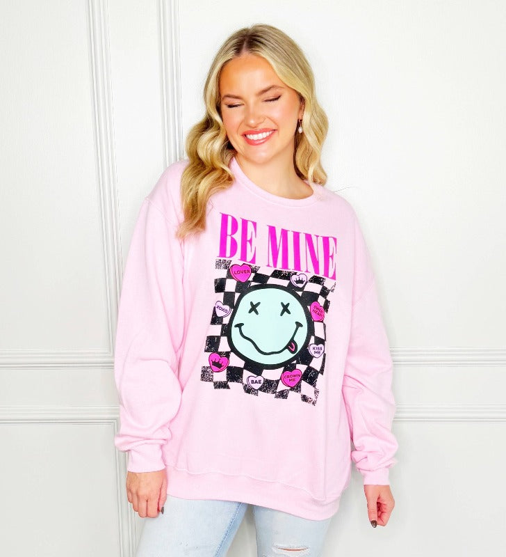 Elevate your Valentine's Day wardrobe with this enchanting "Nirvana Be Mine Tee" designed to express the sentiment of "Be Mine" in a chic and trendy manner! Two colors to choose from: Available in Pink or the Ash color sweatshirt.