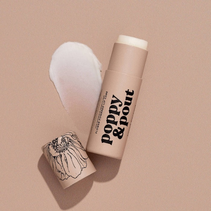 Take your lips on a tropical vacation! Our Island Coconut Lip Balm smells just like those summer months spent on the beach and keeps your lips hydrated for hours. Every Poppy &amp; Pout lip balm is made with 100% natural ingredients and hand-poured into eco-friendly cardboard tubes. 