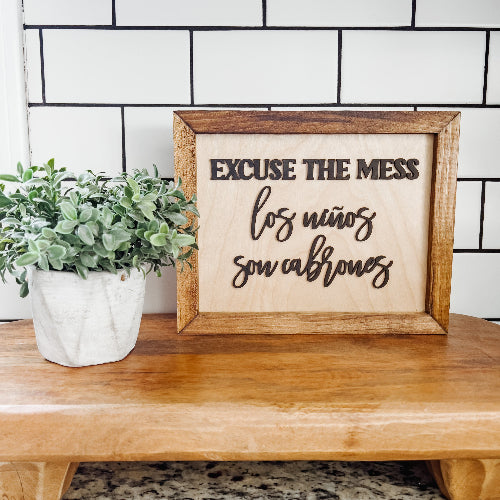 Excuse the mess los niños son cabrones spanglish wood sign