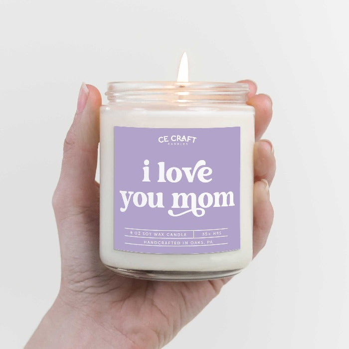 This soy wax candle, I Love You Mom, is the perfect gift for any occasion, whether it's a birthday, Christmas, Mother's Day or just a simple reminder that your mom is the best. It's sure to be a hit and looks adorable in any home. Carefully hand-poured in small batches, this nontoxic, all-natural candle is made with love and will make your mom feel loved.